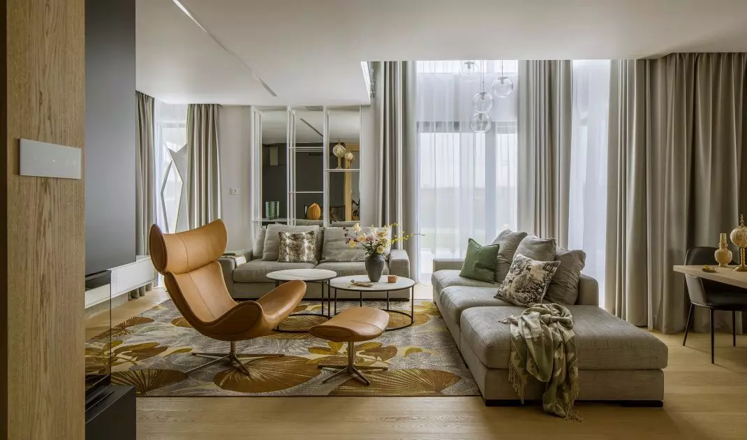 Leaf pattern carpet connects living room and garden