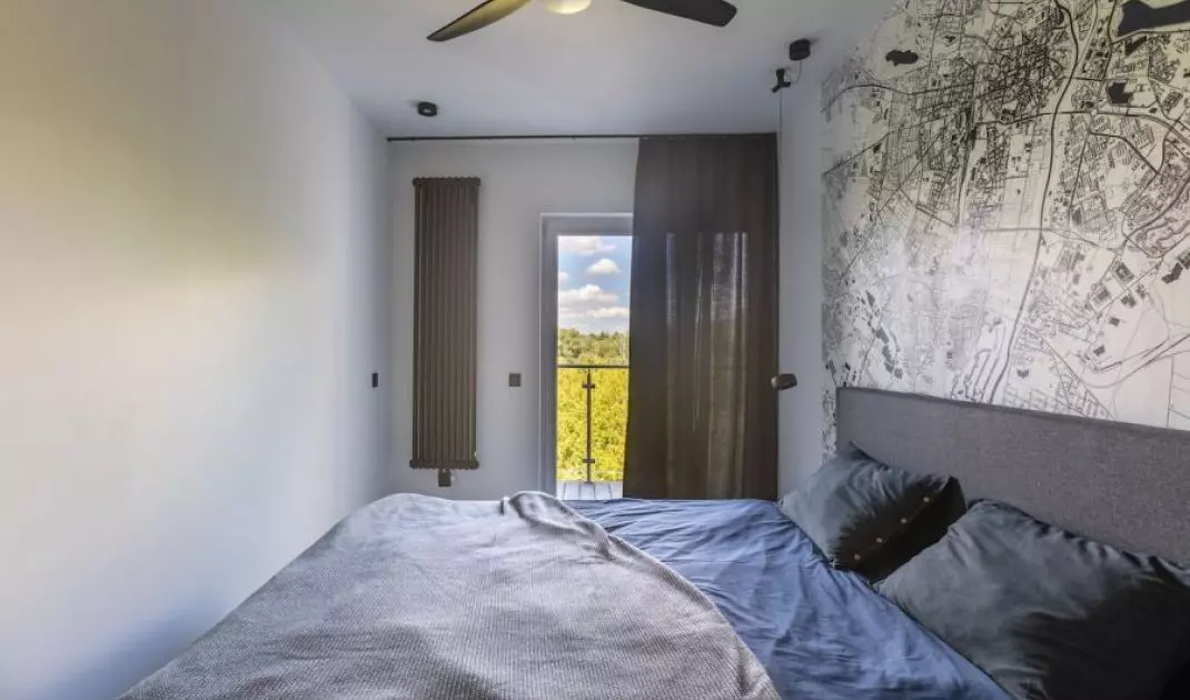 Bedroom with eye-catching wallpaper