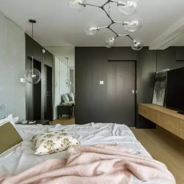 The bedroom combines the tastes of investors