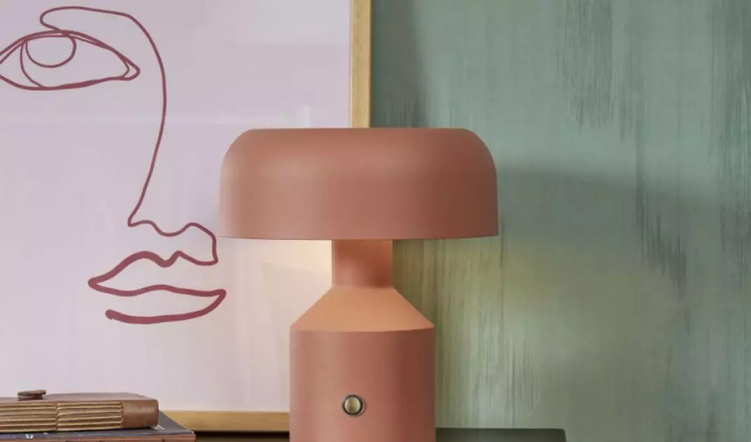A colorful bedside lamp will liven up the arrangement 