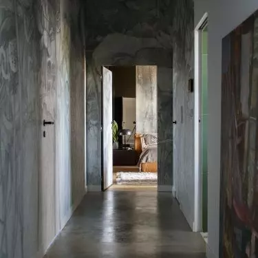 The hallway matches the bedroom in style