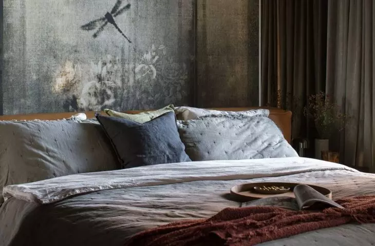 Bedroom with unique wallpaper 