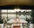 The interior of the dining space is open to the lake