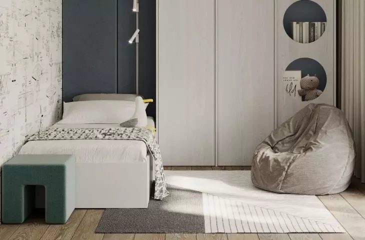 Room for a boy with a unique wallpaper 