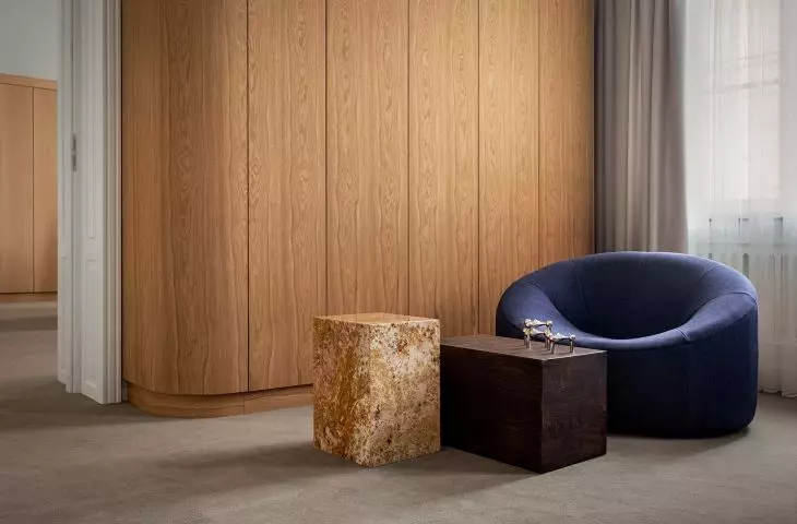 Navy blue armchair and custom tables