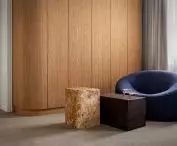 Navy blue armchair and custom tables
