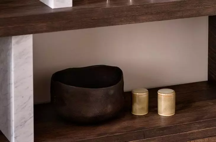 Oak bookcase with stone elements