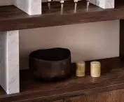 Oak bookcase with stone elements
