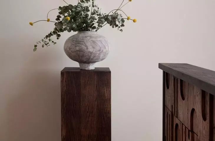 The ceramic vase was made by Marcin Kuberná