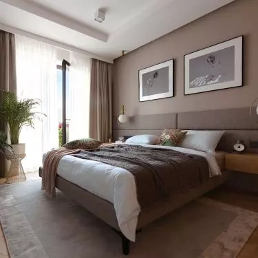 The bedroom wall was lined with upholstered panels
