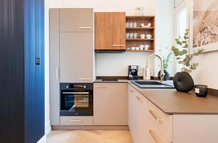The kitchen is located in an alcove