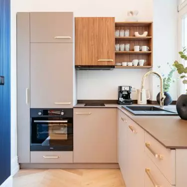 The kitchen is located in an alcove