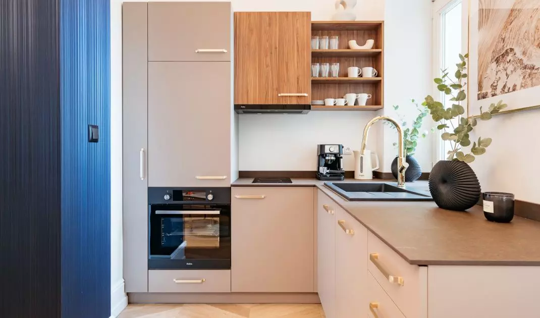 The kitchen is located in an alcove