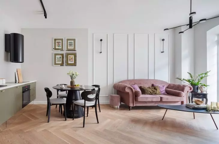 Combine stucco with industrial lighting