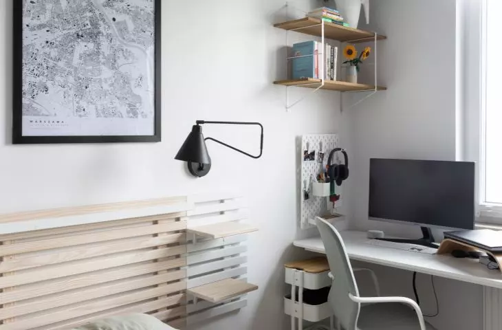 The bedroom has a work area