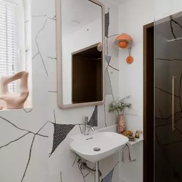 Orange lamp adds color to the interior