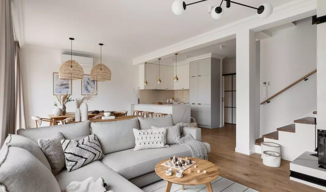 The arrangement uses natural colors and materials