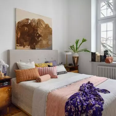 Bedroom with upholstered bed