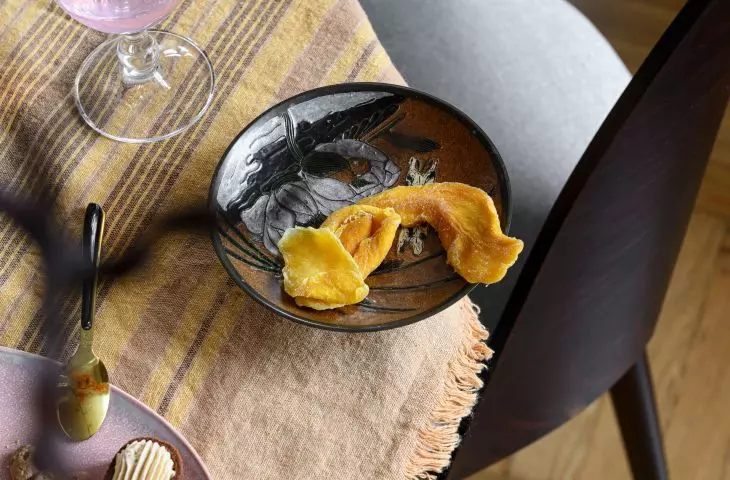 The interior features lots of yellows, oranges, reds and browns