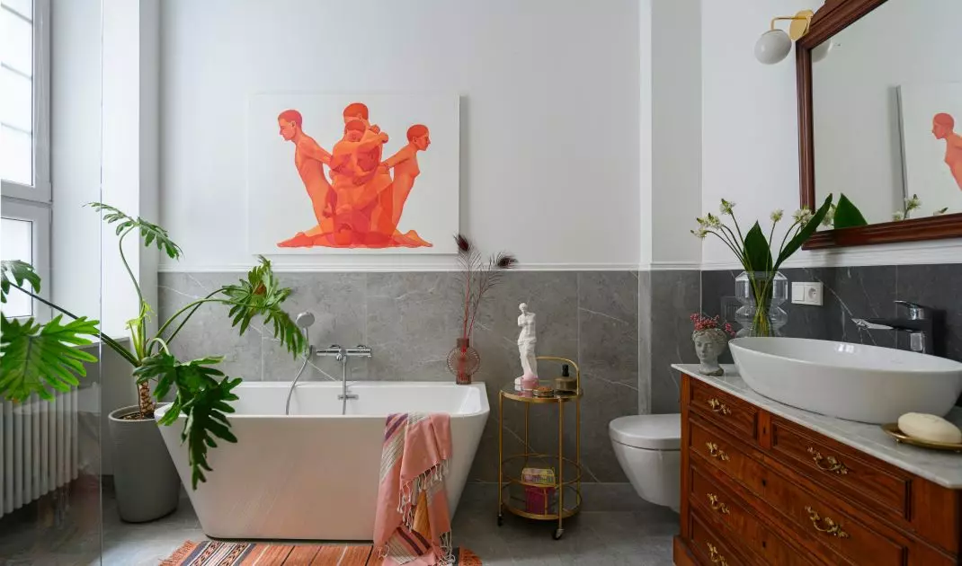 Bathroom with antique dresser