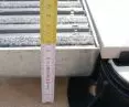 Ustabilizowana wycieraczka BELA w tarasie wentylowanym na konstrukcji o wysokości 10 cm