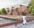 The education center is surrounded by a pedestrian platform