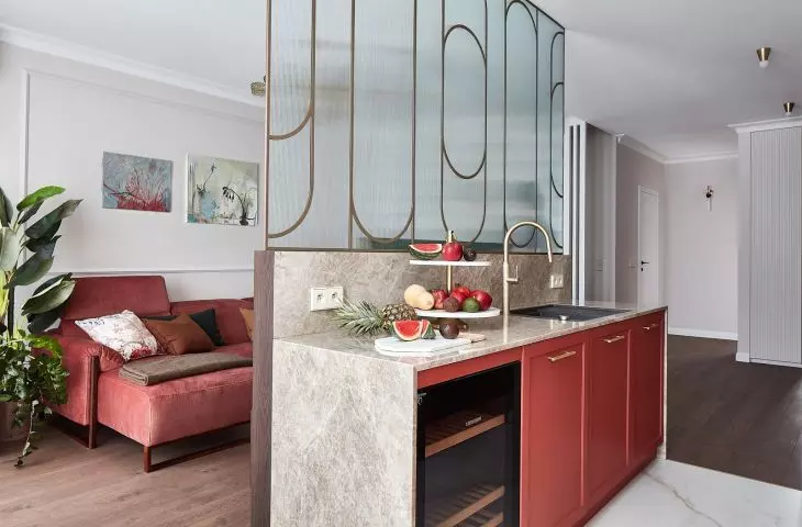 The living area is divided into living room, kitchen and dining room 