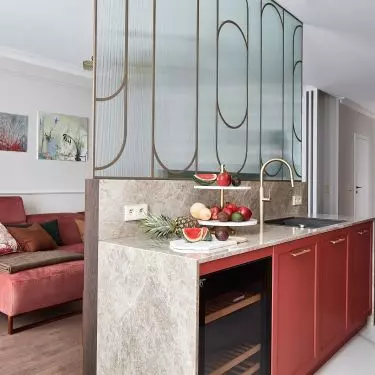The living area is divided into living room, kitchen and dining room