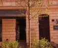On the side of Podwale Street you will find benches surrounding trees and bushes