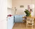 the project began with a vision of a kitchen with a dining room - the lower cabinets in blue are juxtaposed with the white of the rest of the furniture