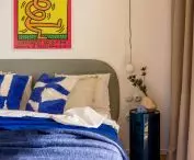 a distinctive pop art piece by American artist Keith Haring was hung in the bedroom