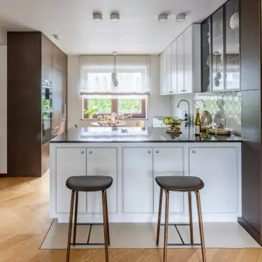 Black and white kitchen with hockers