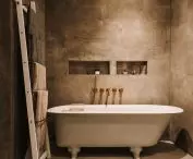 The interior of the bathroom is decorated in the soothing colors of nature