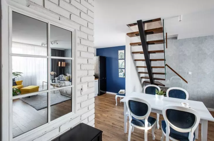 Dining room with white brick