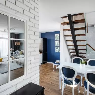 Dining room with white brick