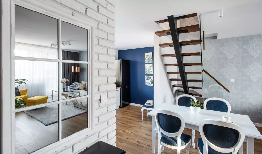 Dining room with white brick