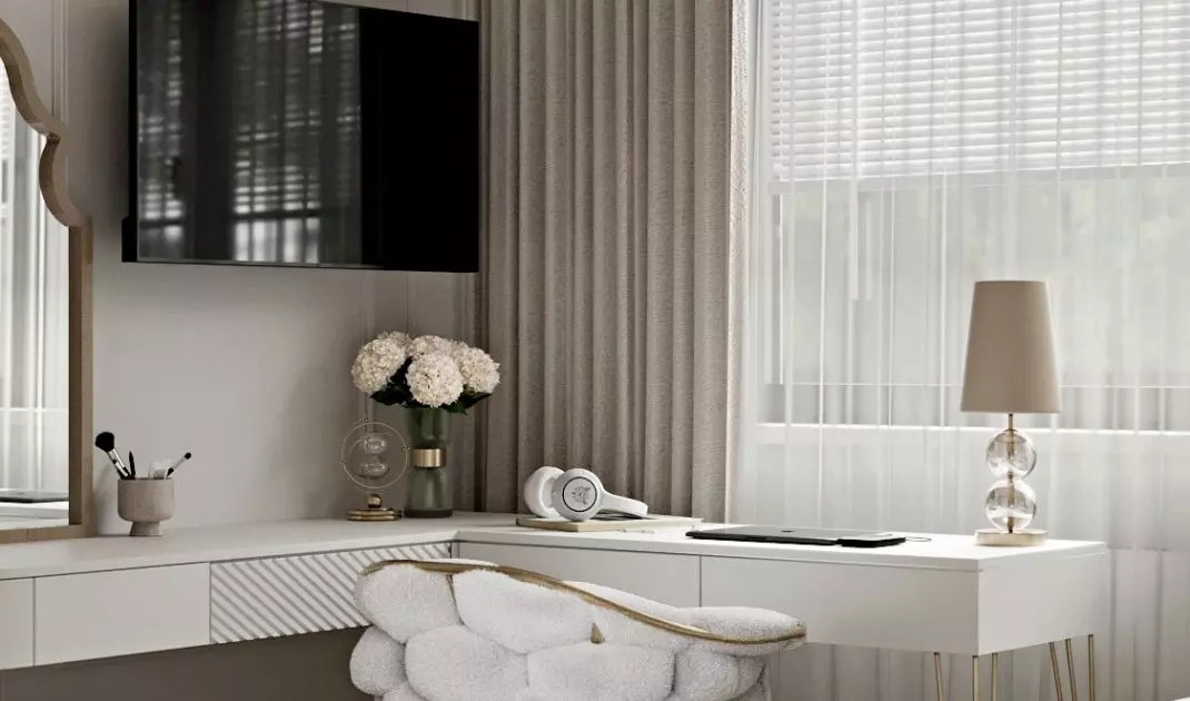 The chair refers in texture to the quilting on the wall