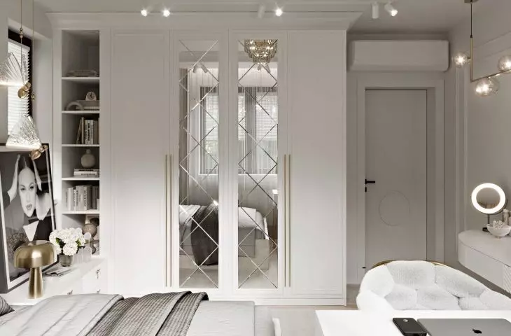 Capacious closet with mirrored panels
