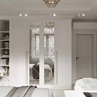 Capacious closet with mirrored panels