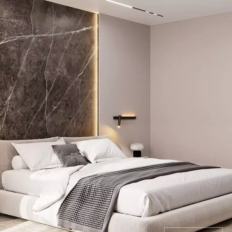 The wall behind the bed was decorated with large-format sintering