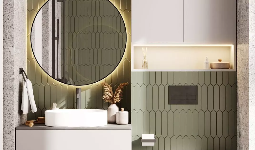 The bathroom was decorated in green and gray colors 