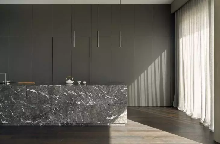 The centerpiece of the kitchen is a marble island 