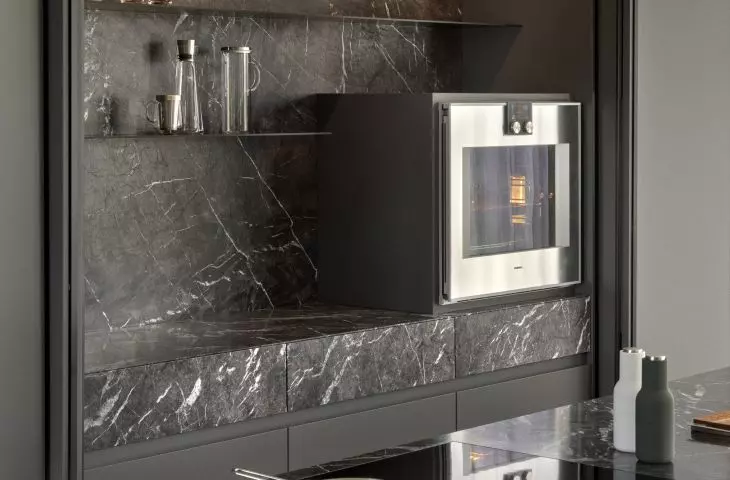 Cabinets for storage are hidden in the built-ins