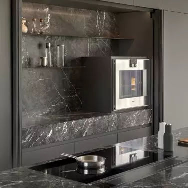 Cabinets for storage are hidden in the built-ins