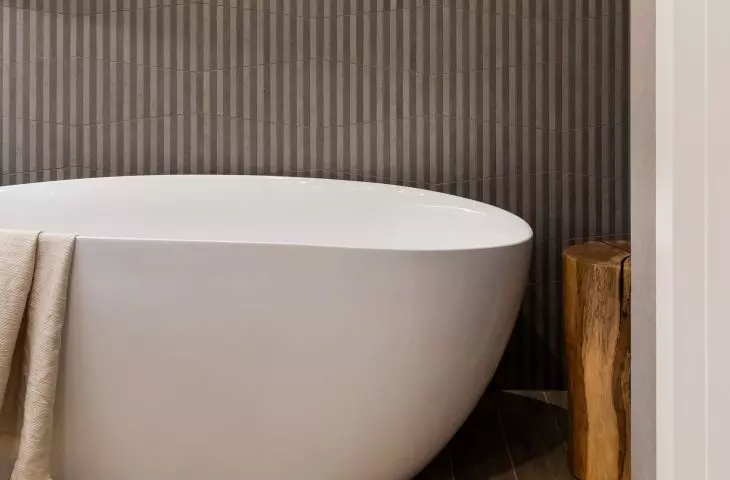 The bathroom has room for a free-standing bathtub