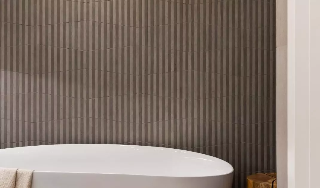 The bathroom has room for a free-standing bathtub