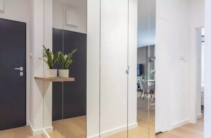 The washer and dryer were placed in a built-in cabinet in the hallway