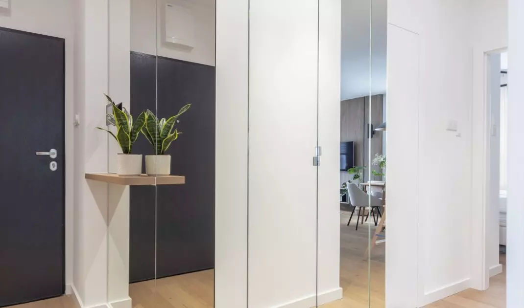 The washer and dryer were placed in a built-in cabinet in the hallway
