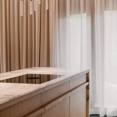 The kitchen island was made by the studio Studio of Simple Forms.