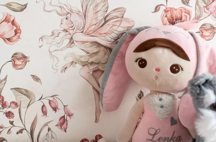 One of the walls was covered with wallpaper in a floral pattern